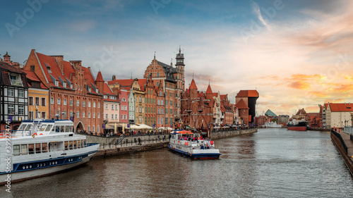 Sunset over the Motława River in Gdańsk photo