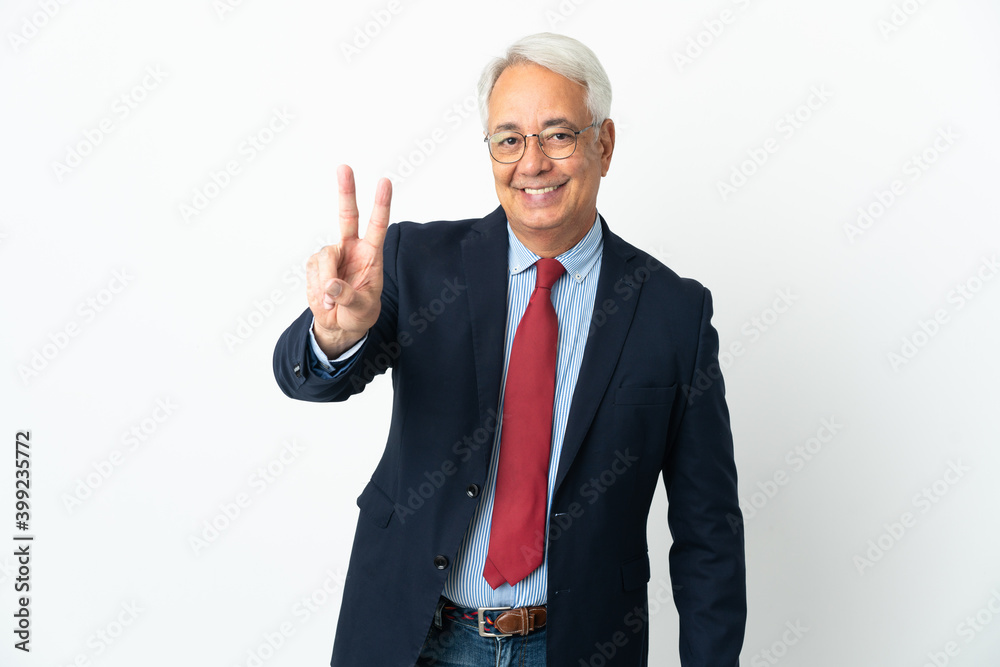 Middle age Brazilian business man isolated on white background smiling and showing victory sign