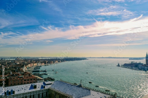 Panoramic view of city Venice from san marco clock tower during sunny day with gorgeous clouds, Italy