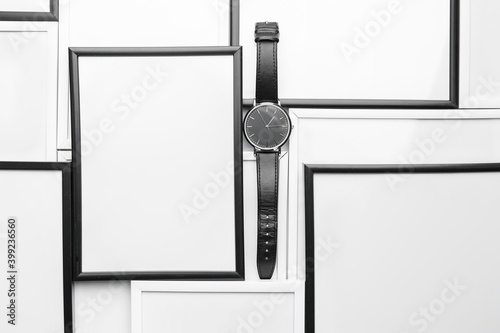Wrist watch with frames on white background