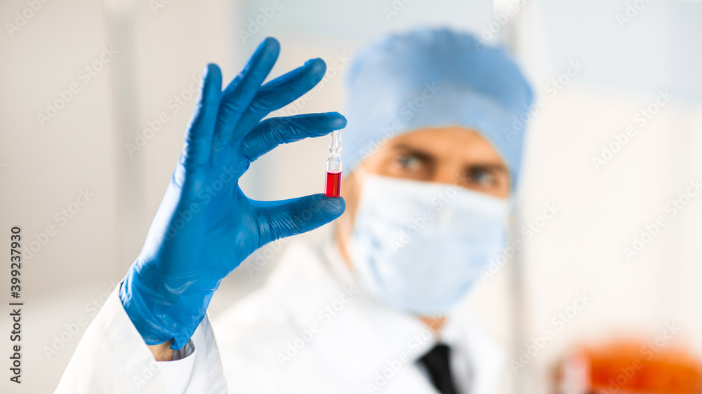 close up. capsule with a vaccine in the hands of a scientist. close up. capsule with a vaccine in the hands of a scientist.
