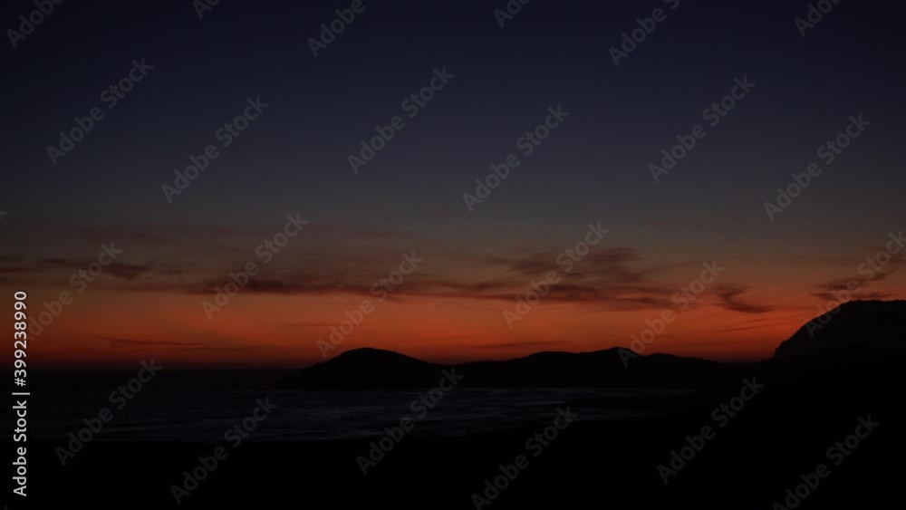 Seascape at evening, sunset over sea water. Night is falling. Nature landscape in Calblanque Park, Murcia Spain. Time laspe