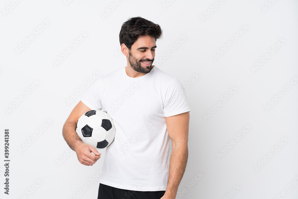 Young handsome man with beard over isolated white background looking side Young handsome man with beard over isolated white background looking side
