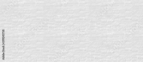 Panorama, White grey brick wall background. Clean stone texture, Abstract surface white color rough brick wall pattern. Concrete, cement brickwork. Blank copy space for design backdrop.