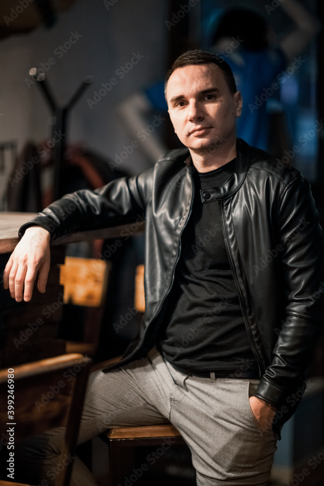 Portrait of a handsome young man. Shooting in a bar Portrait of a handsome young man. Shooting in a bar