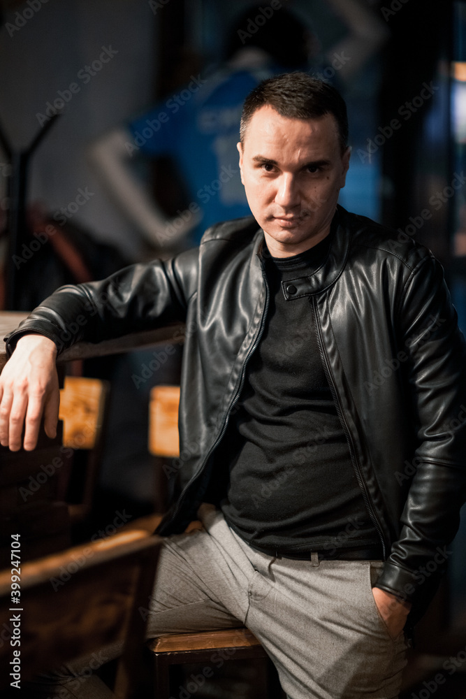 Obraz premium Portrait of a handsome young man. Shooting in a bar