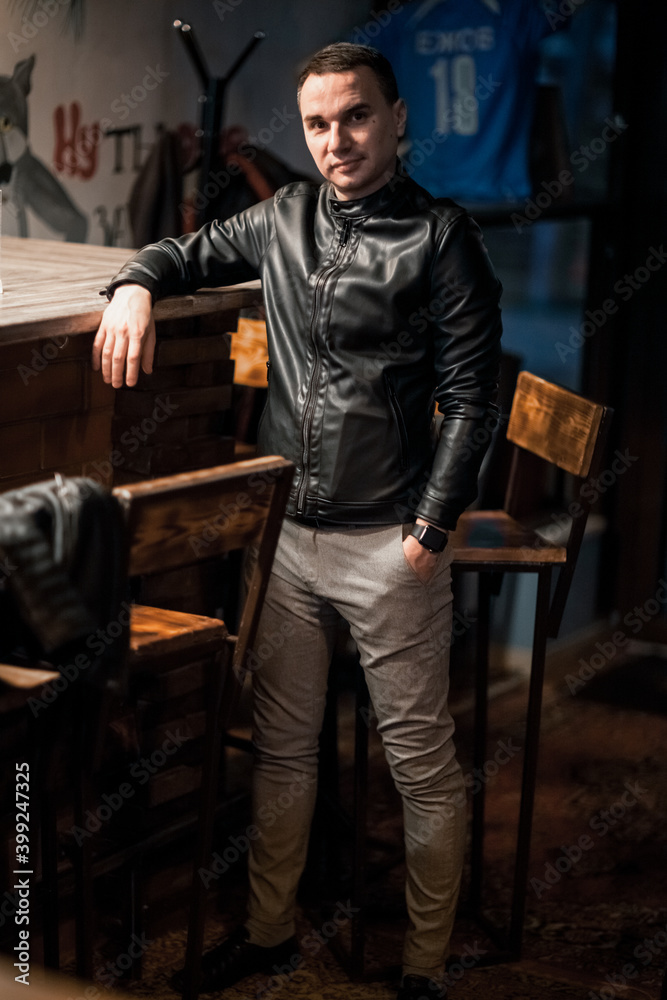 Portrait of a handsome young man. Shooting in a bar Portrait of a handsome young man. Shooting in a bar