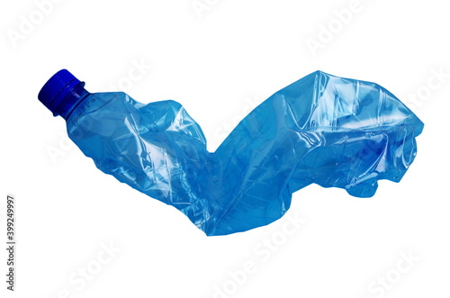 Close up of a plastic bottle isolated on white background. Recycling concept. Used plastic bottle crushed and crumpled against on the white background. Ocean pollution, save the earth concept. 