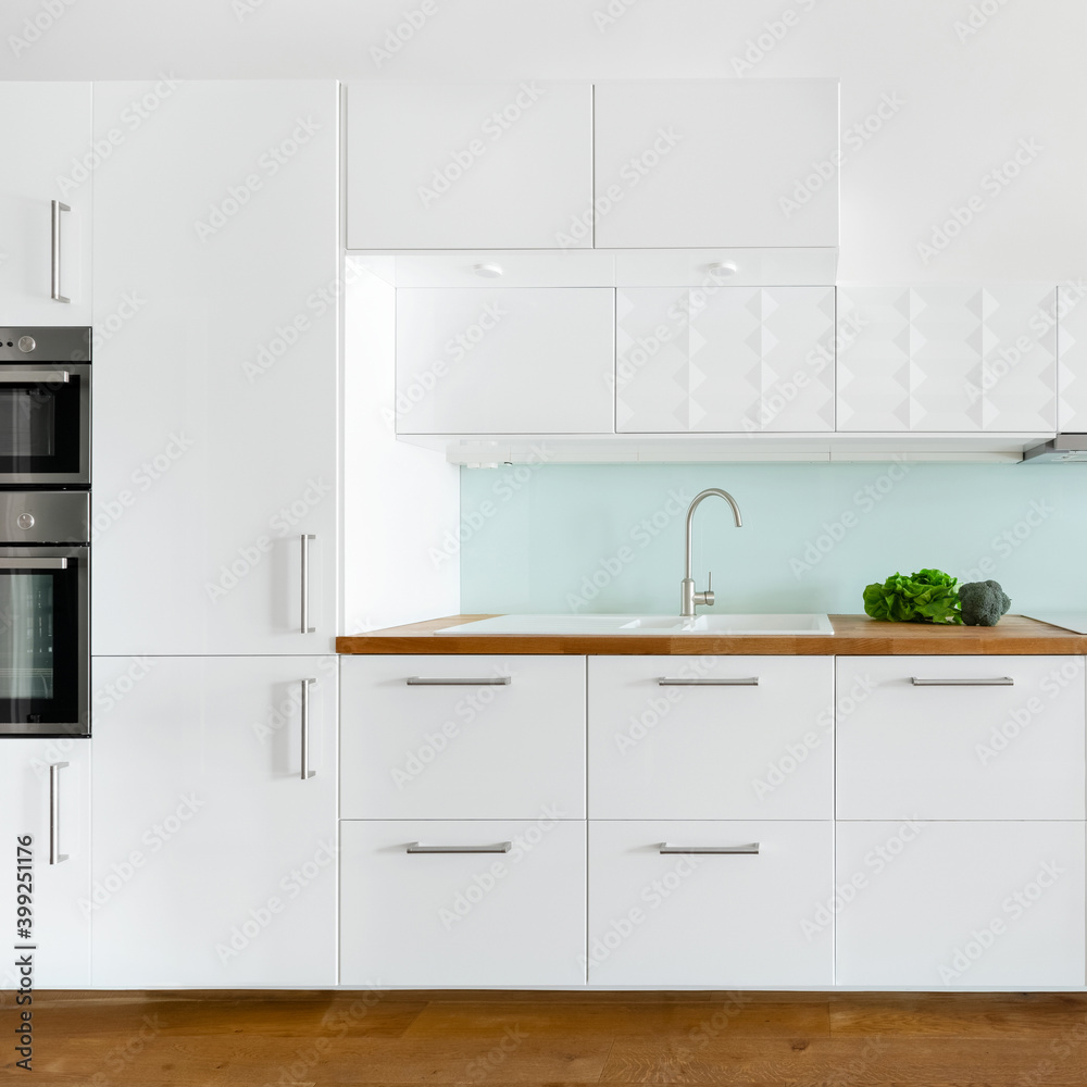Kitchen in white and wood Kitchen in white and wood