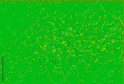 Light green, yellow vector pattern with spheres.