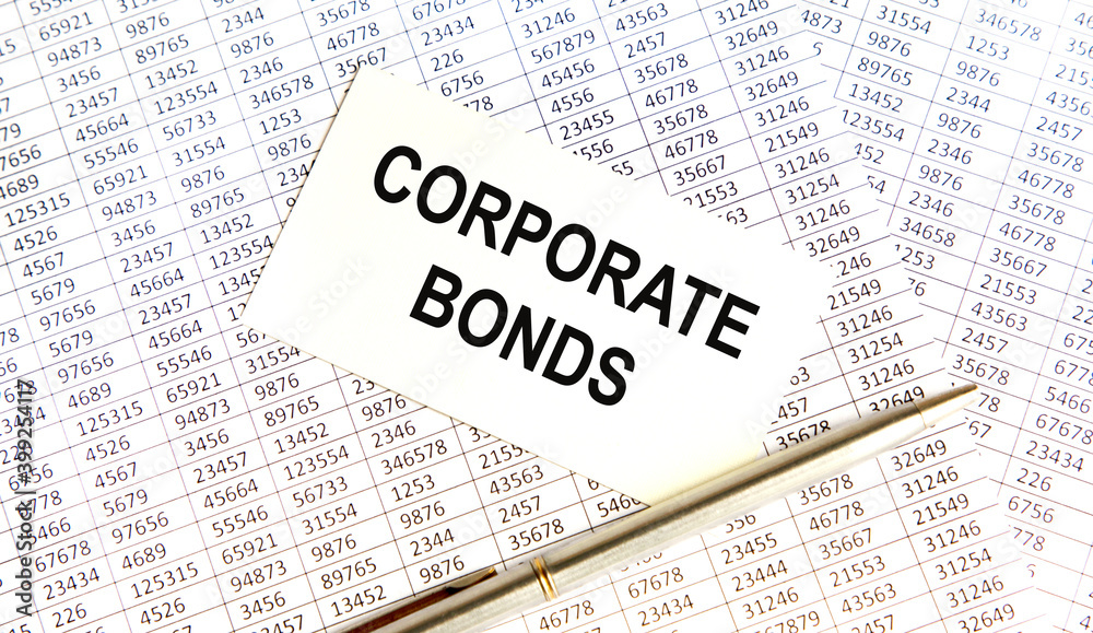 On the business card the text of CORPORATE BONDS, the background are reports, next to the pen. On the business card the text of CORPORATE BONDS, the background are reports, next to the pen.