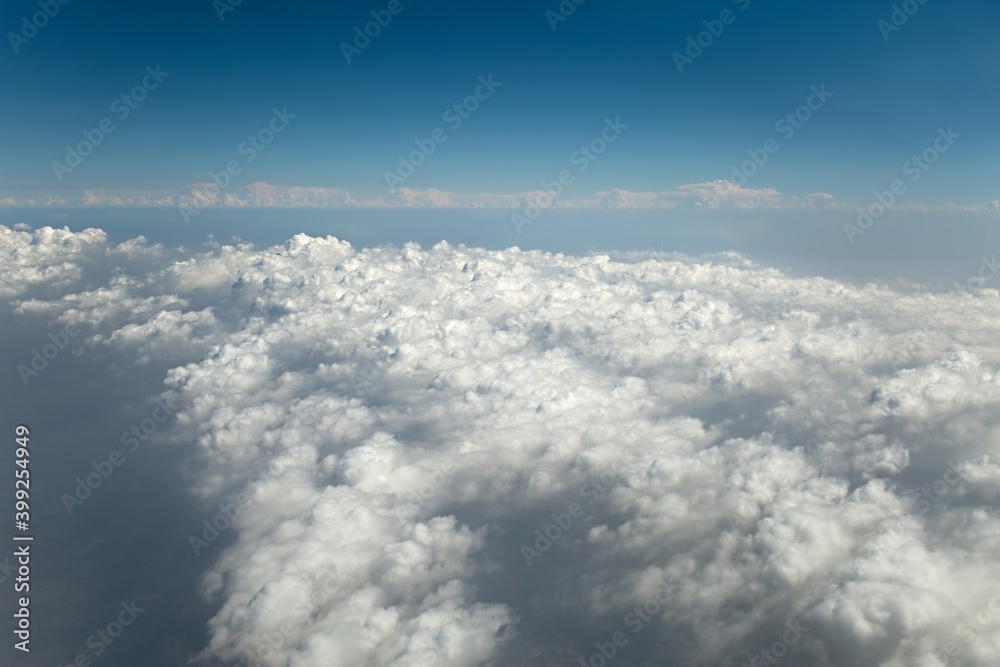 Clouds seen from above on a plane flight Clouds seen from above on a plane flight