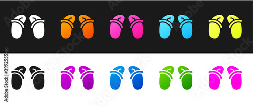 Set Flip flops icon isolated on black and white background. Beach slippers sign. Vector.