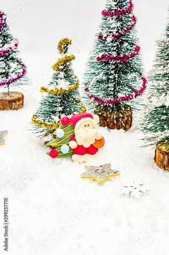 Small decorative Christmas trees with New Year's decor