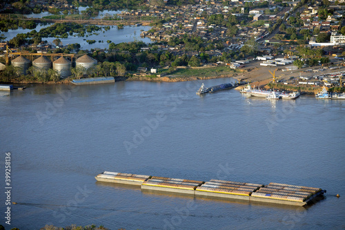 Vista aérea de chata transportando carga na hidrovia do Rio Madeira em  Porto Velho photo