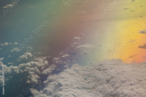 Aerial view of the Tyrrhenian sea. Colors produced when light is passed through the airplane window.