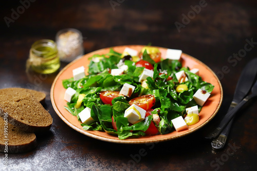 Healthy salad with spinach and white cheese. The keto diet is friendly. Healthy food concept.