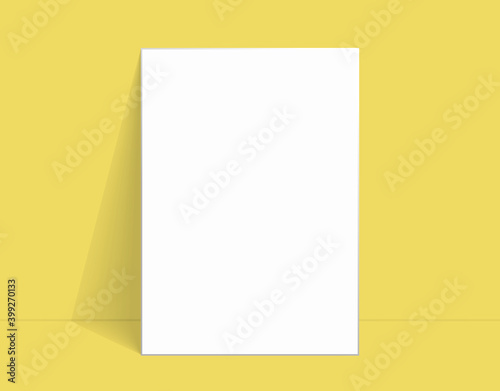 White poster mockup standing on the floor near Illumination yellow color wall. Blank Canvas Mockup for design.