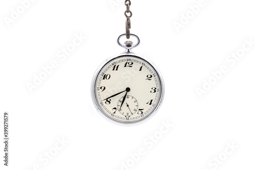 Old chrome pocket watch with numbers in classic letter. Isolated in white background.