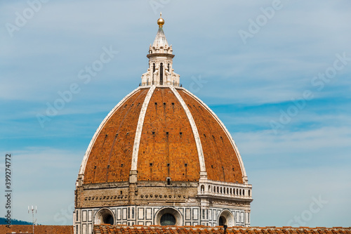 Obraz na plátně Lovely close-up view of Florence Cathedral's octagonal Dome with a cupola on top that is crowned with a gilt copper ball and cross, providing a lookout for visitors