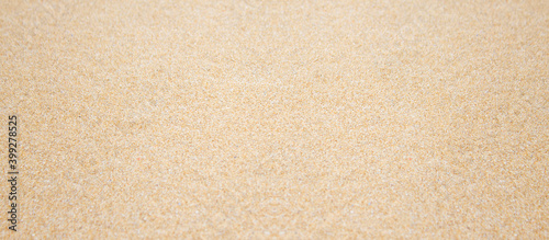 Sand beach texture background banner with copy space