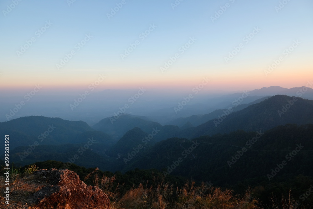 Sunset on mountains panoramic view in nature wallpaper background
