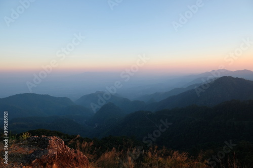 Sunset on mountains panoramic view in nature wallpaper background