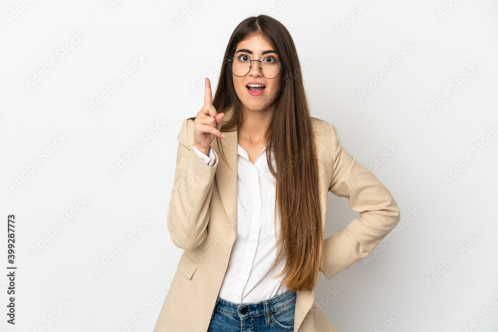 Young caucasian woman isolated on white background intending to realizes the solution while lifting a finger up Young caucasian woman isolated on white background intending to realizes the solution while lifting a finger up