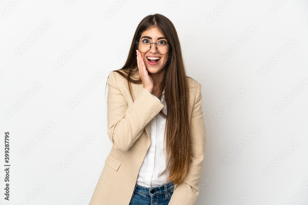 Fototapeta premium Young caucasian woman isolated on white background with surprise and shocked facial expression