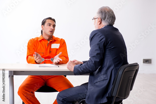 Obraz na plátně Young captive meeting with advocate in pre-trial detention