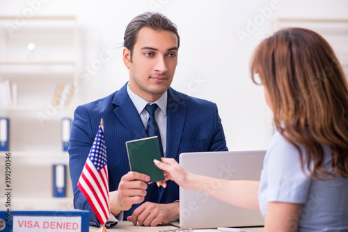 Young woman visiting american embassy for visa