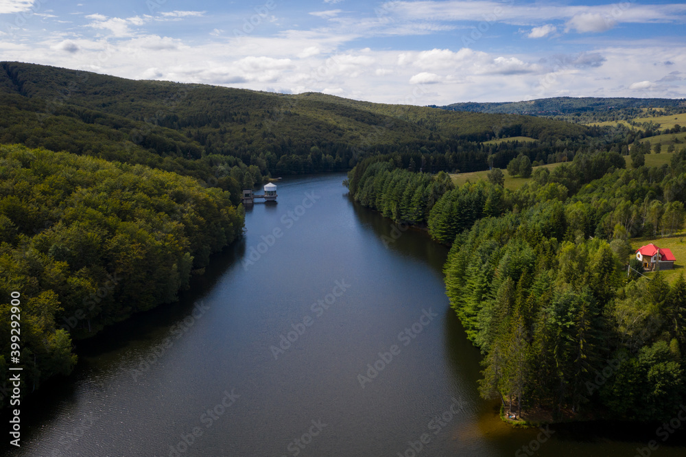 Drone photograph of Trei Ape mountain lake in Semenic mountains, Romania