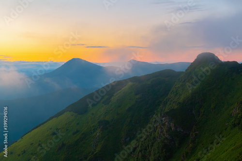 Colorful sunrise landscape in the mountains, scenic wild nature panorama at the dawn, Carpathians, Ukraine © O.Farion