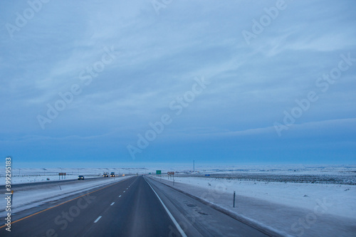 Winter highway among mountains covered snow. Utah, USA, 12-12-2019