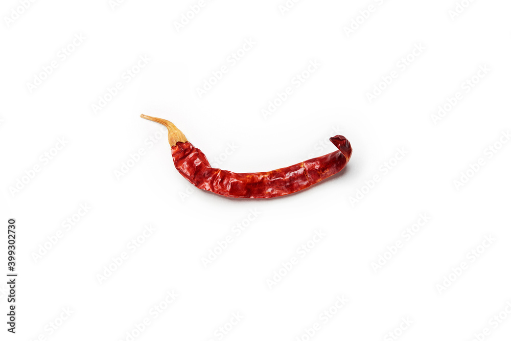 Dry single alone red hot chilli pepper isolated on the white background Dry single alone red hot chilli pepper isolated on the white background
