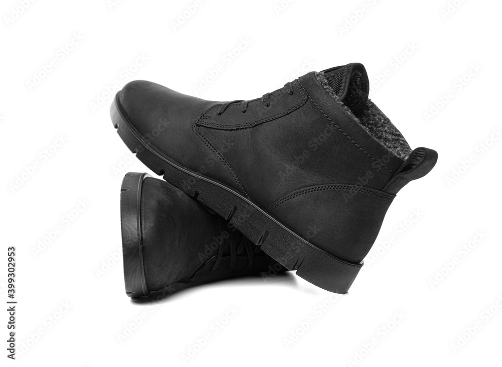 Winter shoes isolated on white background. Winter black boots. Winter shoes isolated on white background. Winter black boots.