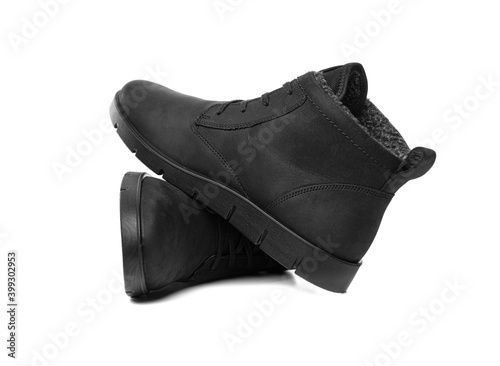 Winter shoes isolated on white background. Winter black boots.