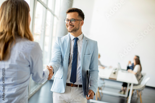 Young business partners mak...