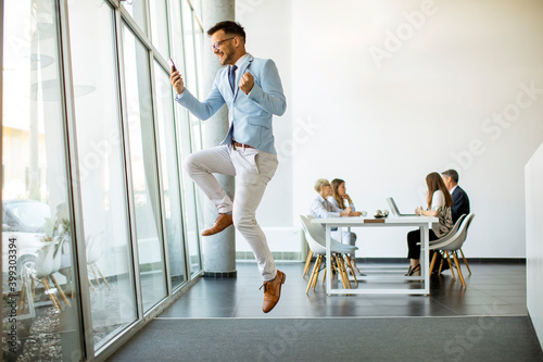 Young businessman with smar...