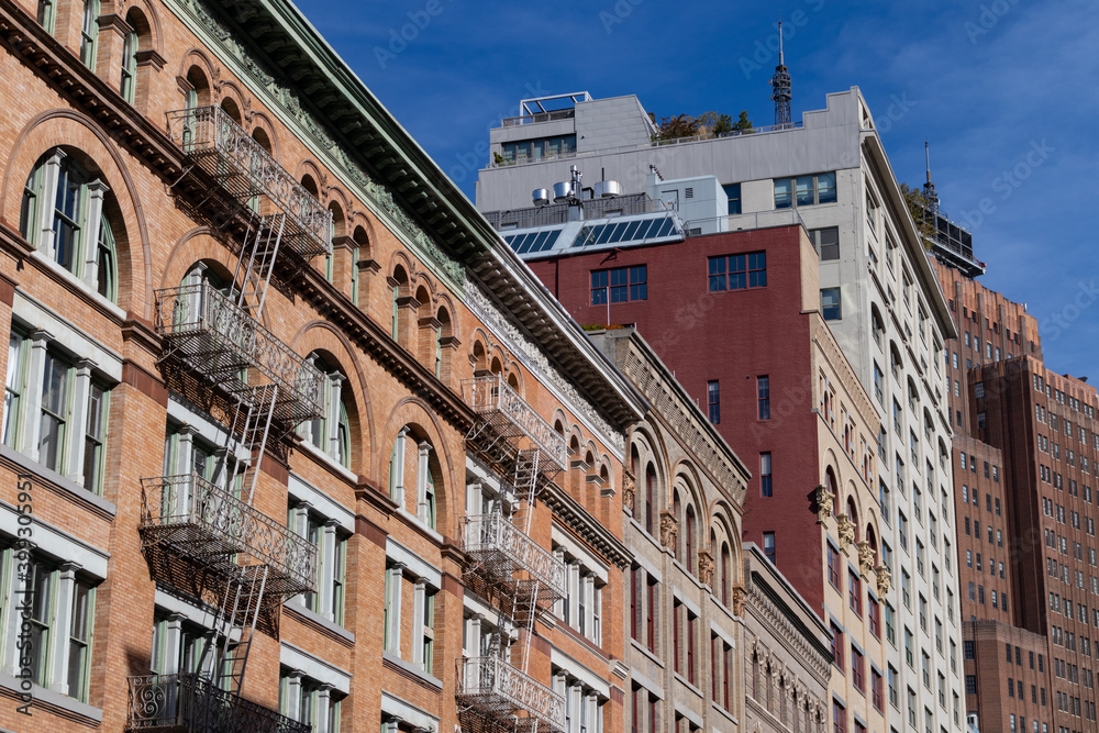 Row of Colorful Brick Buildings along a Street in Tribeca of New York City Row of Colorful Brick Buildings along a Street in Tribeca of New York City