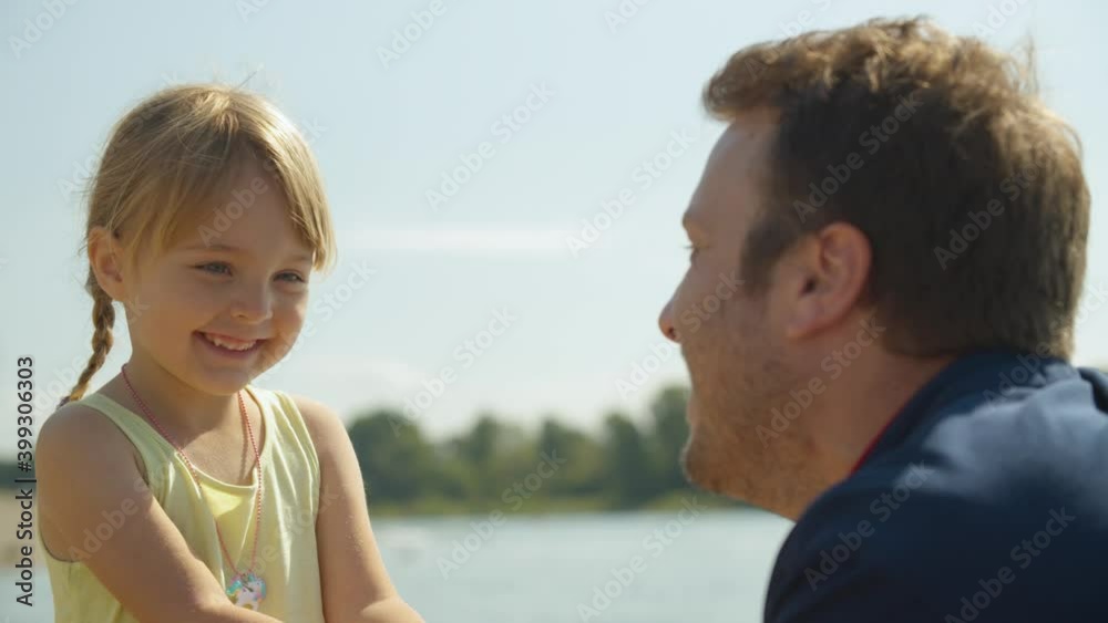 Father and Daughter smiling at each other / happy family Father and Daughter smiling at each other / happy family