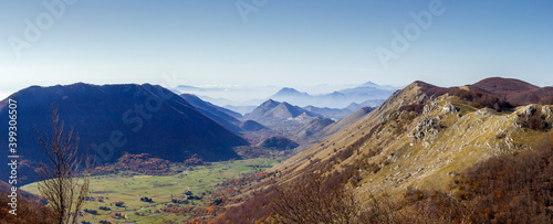 landscape valley of matese mountains and with Letino in the background on Apennines in italy photo