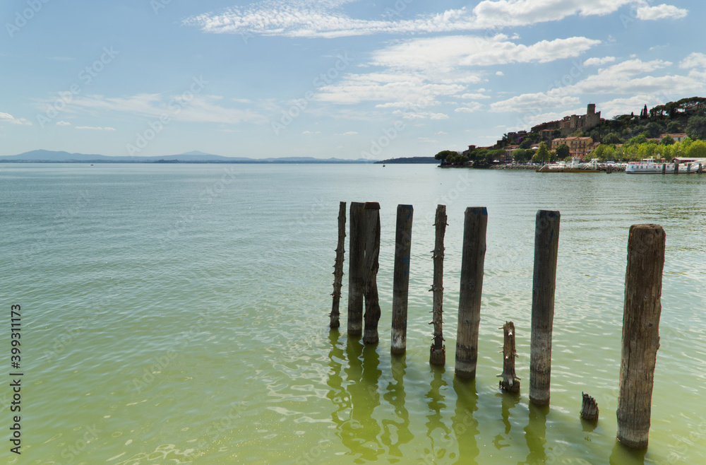 View of the village of Passignano on Lake Trasimeno, Italy View of the village of Passignano on Lake Trasimeno, Italy
