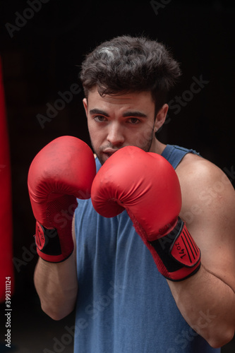 male boxing fight red gloves