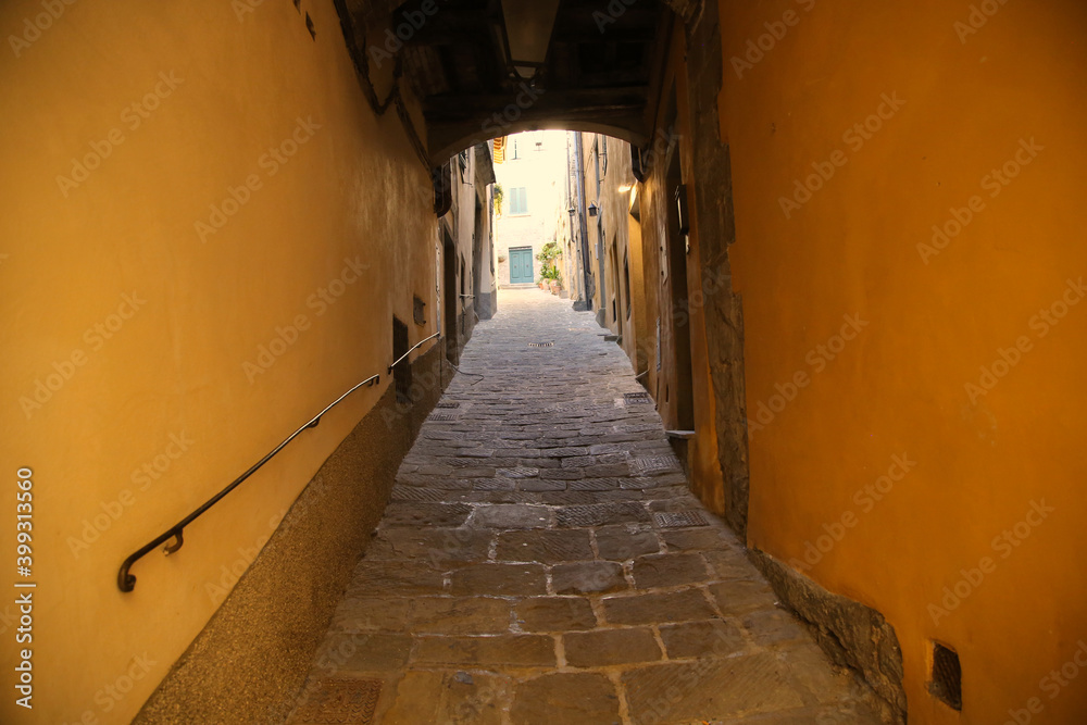 Alley in the medieval city of Cortona, Italy