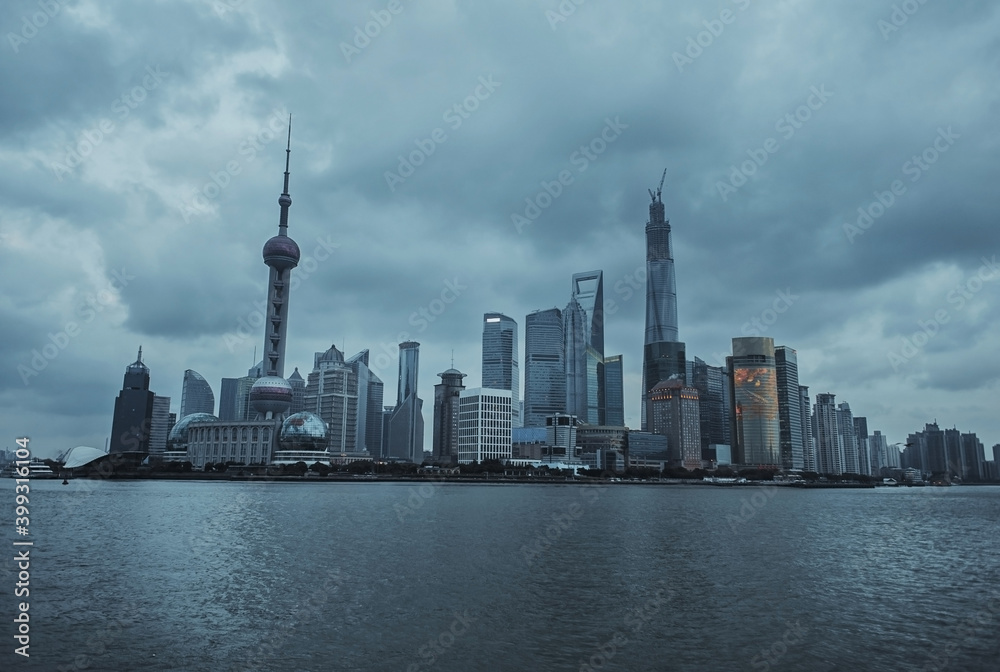 View from the embankment of Shanghai to the other side. Orient Pearl Tower Business Center and Observation Deck View from the embankment of Shanghai to the other side. Orient Pearl Tower Business Center and Observation Deck
