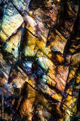 Labradorite unpolished rough specimen and colorful warm colored