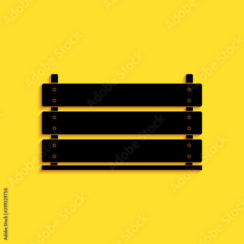 Black Wooden box icon isolated on yellow background. Grocery basket, storehouse crate. Empty wooden container for vegetables, products. Long shadow style. Vector.