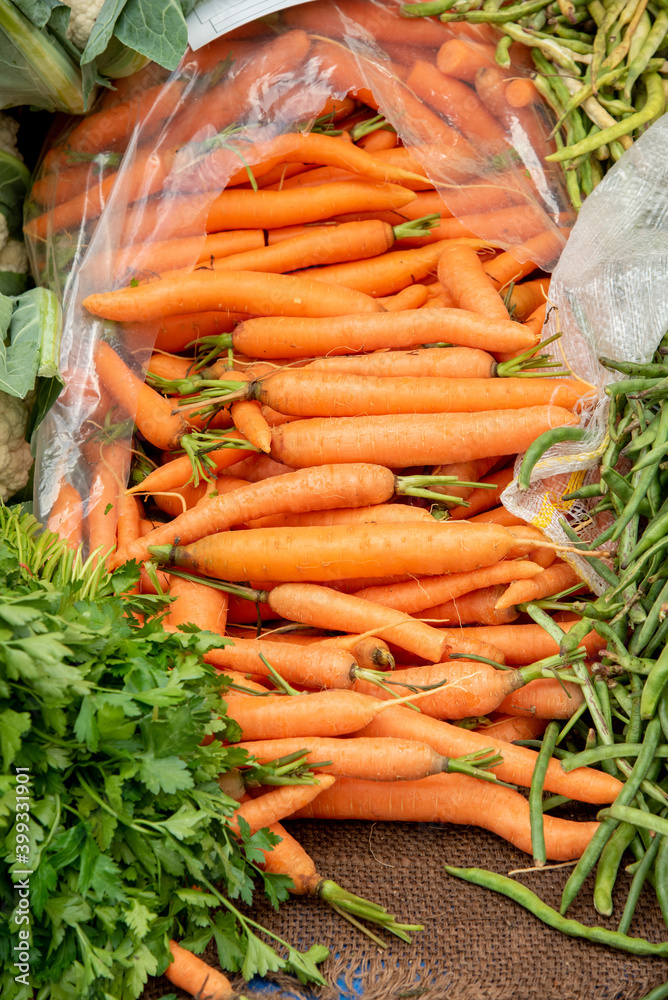 raw ripe red carrots on market counter raw ripe red carrots on market counter