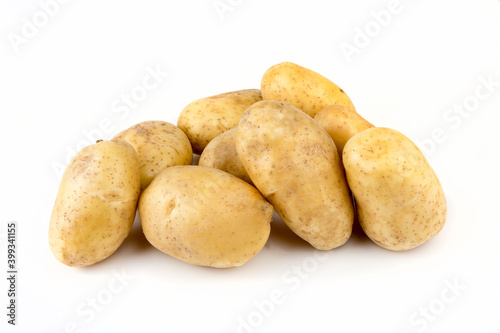 Fresh organic vegetables  potatoes on the white background.